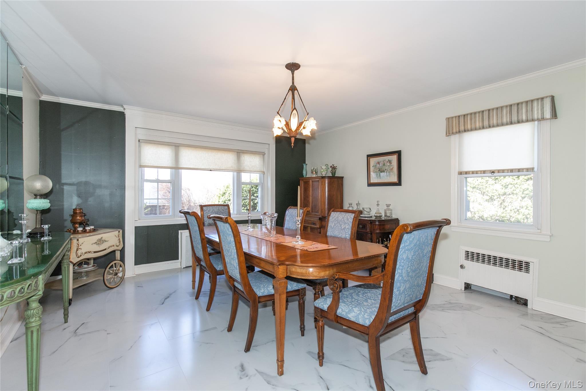 8 Plymouth Road Great Neck, NY 11023 - Photo 5 of 25 a view of a dining room with furniture window and outside view