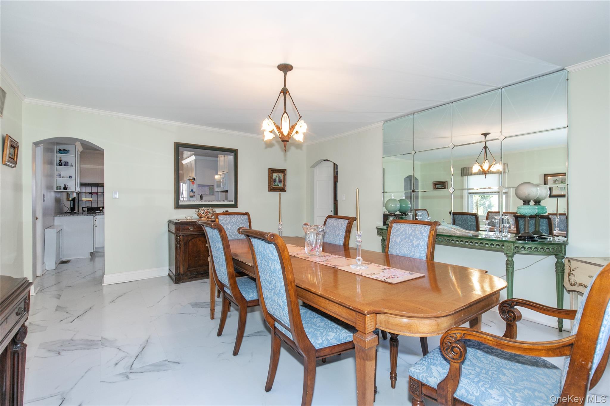 8 Plymouth Road Great Neck, NY 11023 - Photo 6 of 25 a view of a dining room with furniture and wooden floor