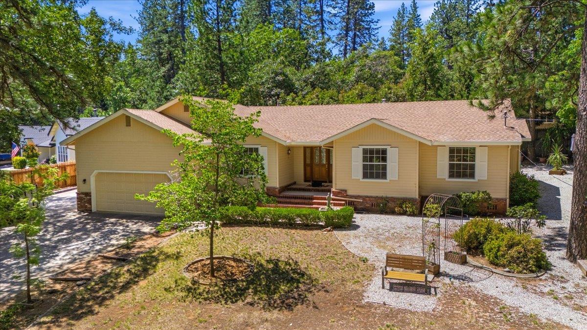 12600 Friar Tuck Road Grass Valley, CA 95949 - Photo 1 of 56 a view of house with outdoor seating