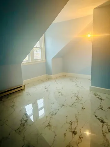 view of an empty room with a window