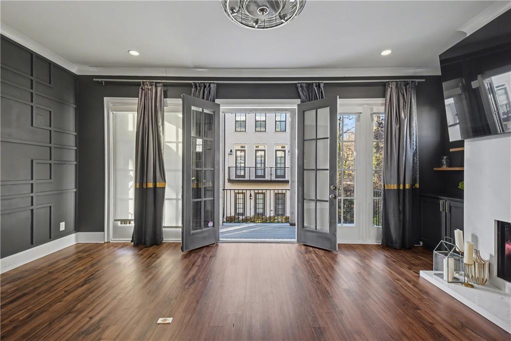 2067 Wheaton Way Atlanta, GA 30328 - Photo 17 of 64 a view of an entryway with wooden floor