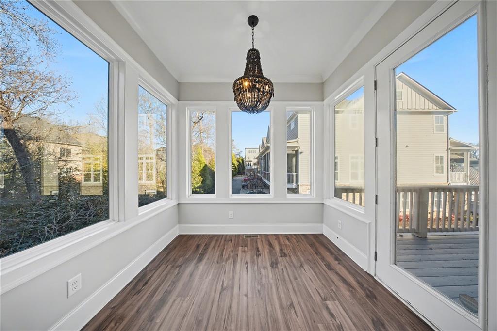 2067 Wheaton Way Atlanta, GA 30328 - Photo 34 of 64 a view of an entryway with wooden floor
