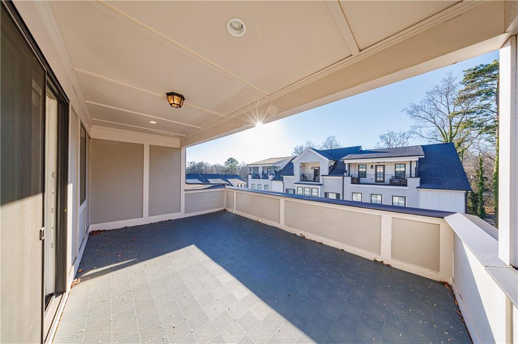2067 Wheaton Way Atlanta, GA 30328 - Photo 55 of 64 a view of a kitchen with a sink and cabinets