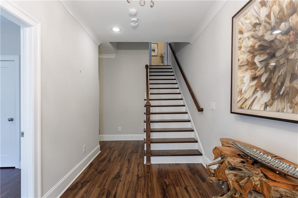 2067 Wheaton Way Atlanta, GA 30328 - Photo 9 of 64 a view of entryway with wooden floor