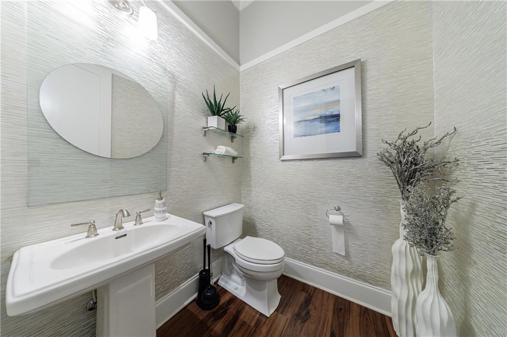 2067 Wheaton Way Atlanta, GA 30328 - Photo 10 of 64 a bathroom with a sink and a mirror