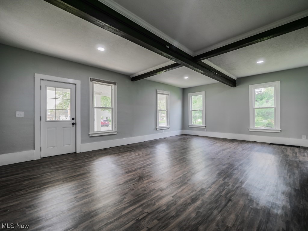 39330 Chestnut Ridge Road Elyria, OH 44035 - Photo 4 of 32 Foyer with dark hardwood flooring and beam ceiling