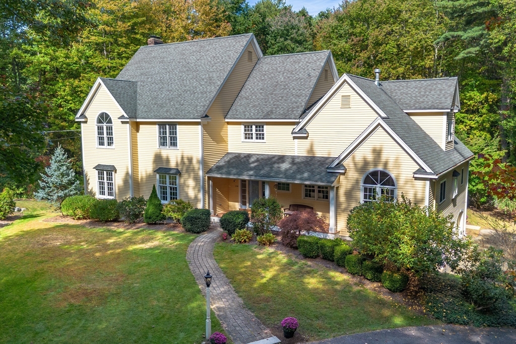 104 Green Road Bolton, MA 01740 - Photo 1 of 42 a view of house with garden