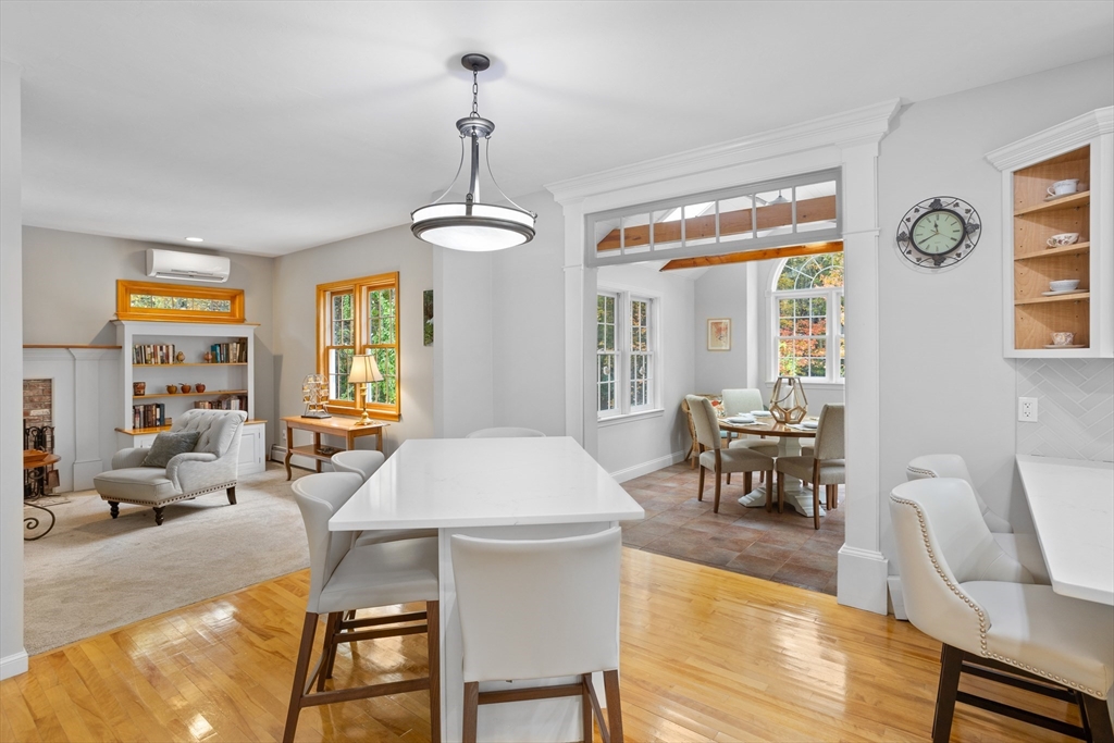 104 Green Road Bolton, MA 01740 - Photo 11 of 42 a view of a dining room with furniture window and outside view