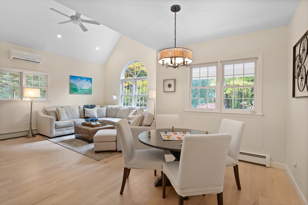 104 Green Road Bolton, MA 01740 - Photo 15 of 42 a view of a dining room with furniture window and outside view