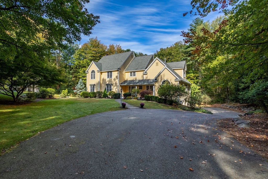 104 Green Road Bolton, MA 01740 - Photo 2 of 42 a view of a house with a yard