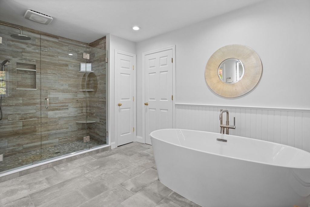 104 Green Road Bolton, MA 01740 - Photo 26 of 42 a bathroom with a bathtub and a sink