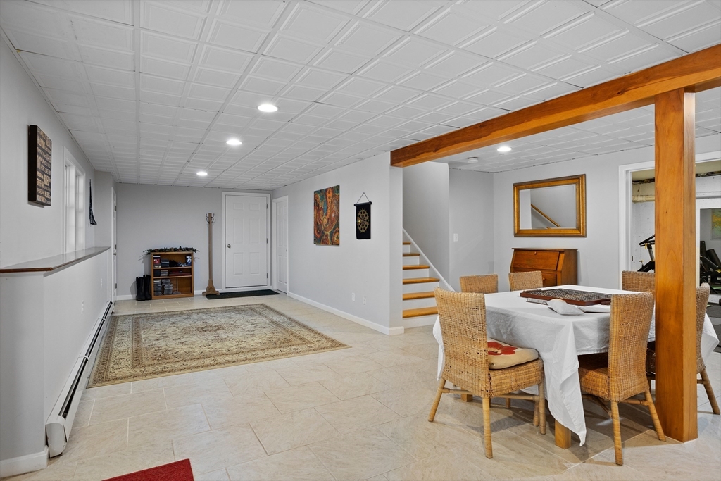 104 Green Road Bolton, MA 01740 - Photo 36 of 42 a view of a dining room with furniture