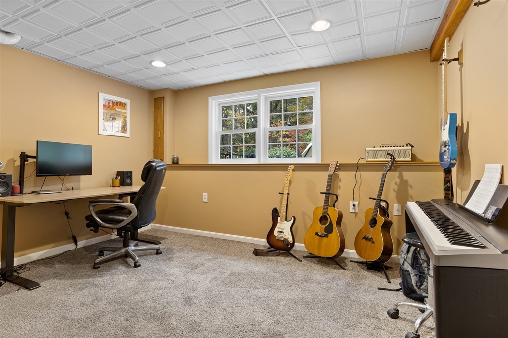 104 Green Road Bolton, MA 01740 - Photo 38 of 42 a view of a workspace with furniture and a window
