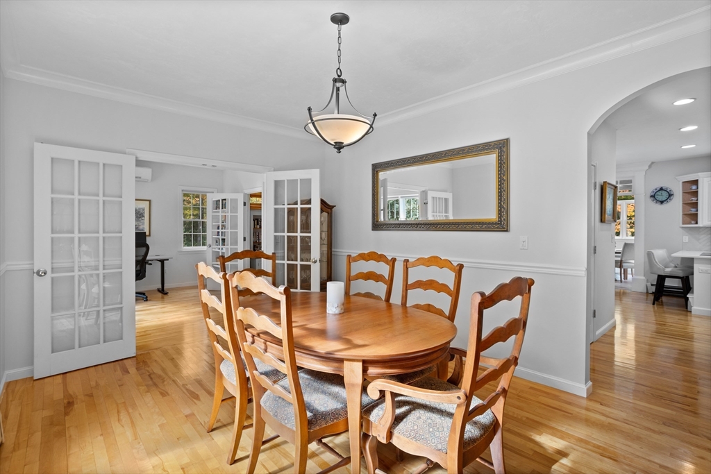 104 Green Road Bolton, MA 01740 - Photo 4 of 42 a view of a dining room with furniture and wooden floor