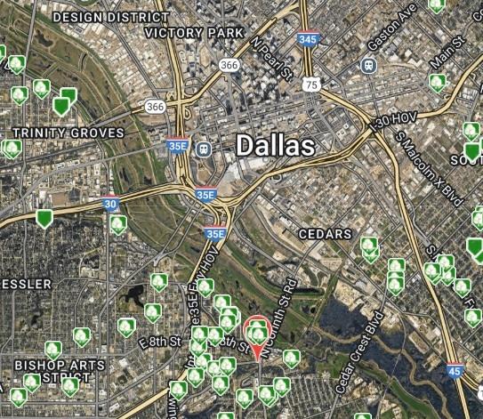 410 Albright Street Dallas, TX 75203 - Photo 2 of 3 a street sign that is on a tree