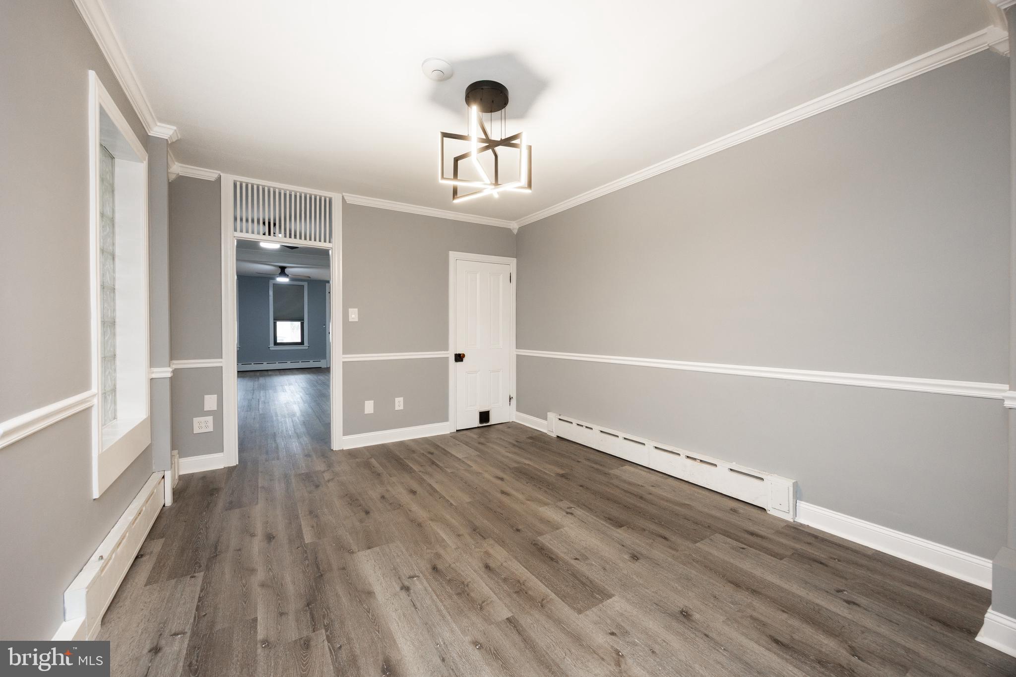 313 Chestnut Street Spring City, PA 19475 - Photo 15 of 38 a view of empty room with wooden floor