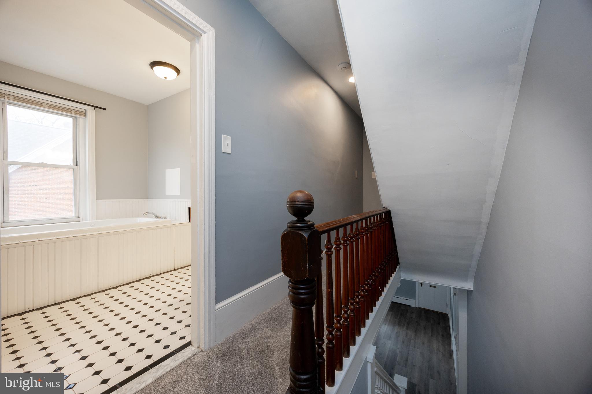 313 Chestnut Street Spring City, PA 19475 - Photo 24 of 38 a view of a hallway with wooden floor and staircase