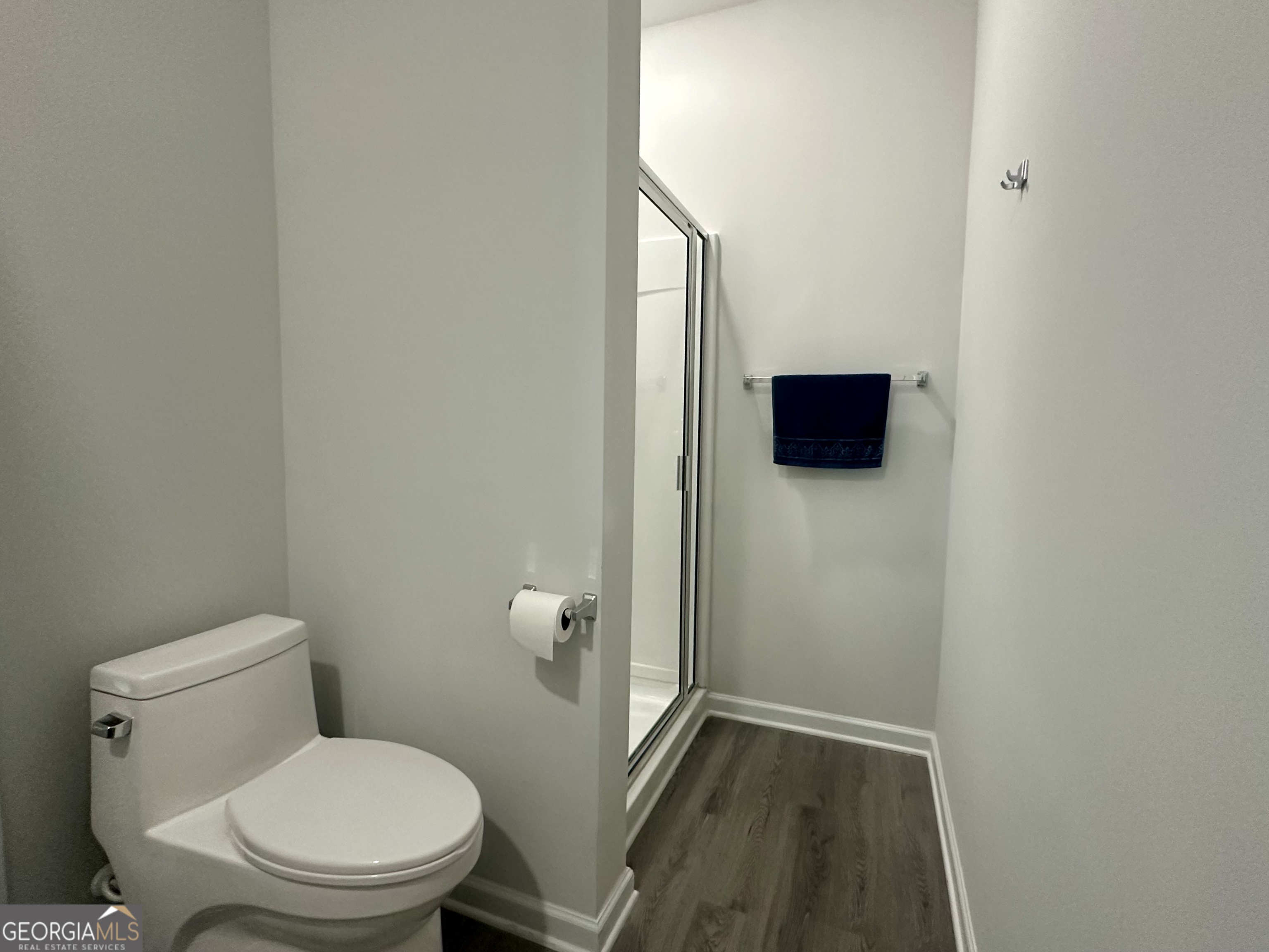 604 Georgian Walk Byron, GA 31008 - Photo 12 of 15 a bathroom with a toilet