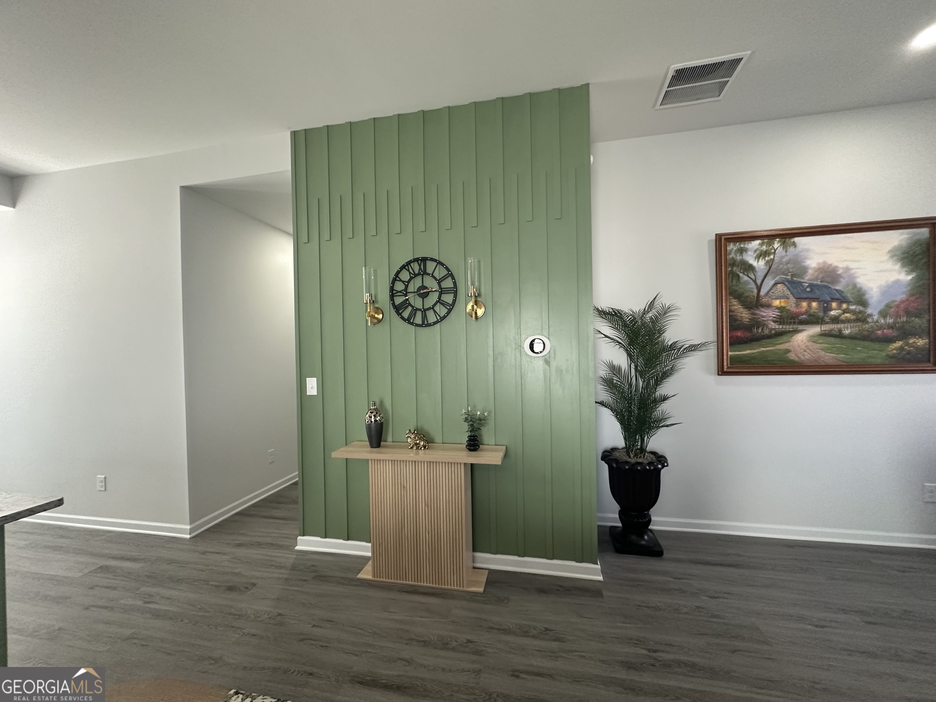 604 Georgian Walk Byron, GA 31008 - Photo 7 of 15 a view of a hallway with wooden floor