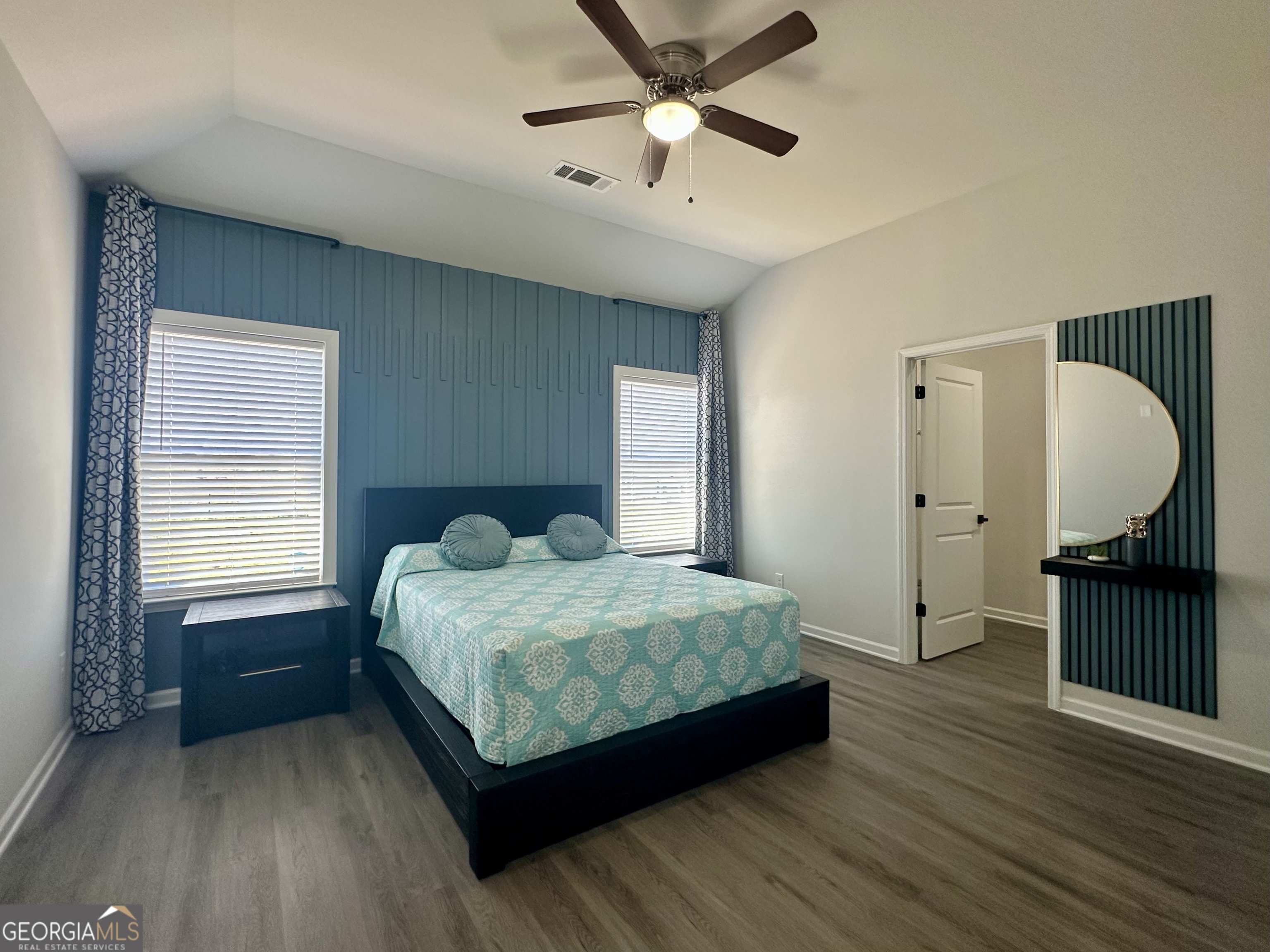 604 Georgian Walk Byron, GA 31008 - Photo 10 of 15 a bedroom with a bed dresser and a window
