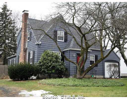 180 Beverly Road Wethersfield, CT 06109 - Photo 1 of 1 a front view of a house with garden