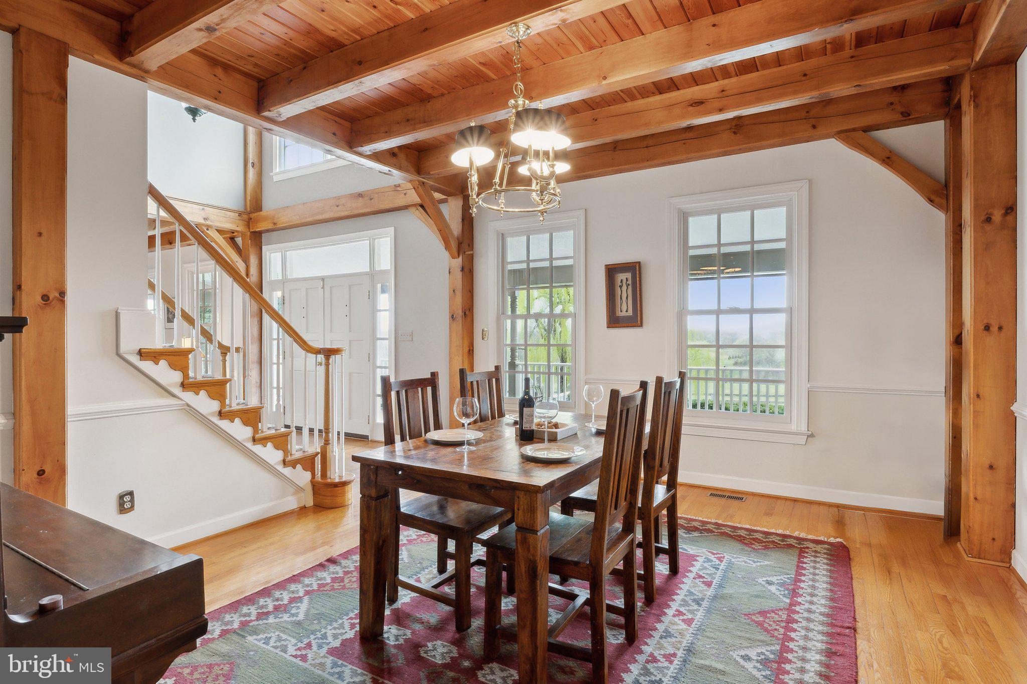 18600 Barnesville Road Barnesville, MD 20838 - Photo 28 of 108 a view of a dining room with furniture window and wooden floor