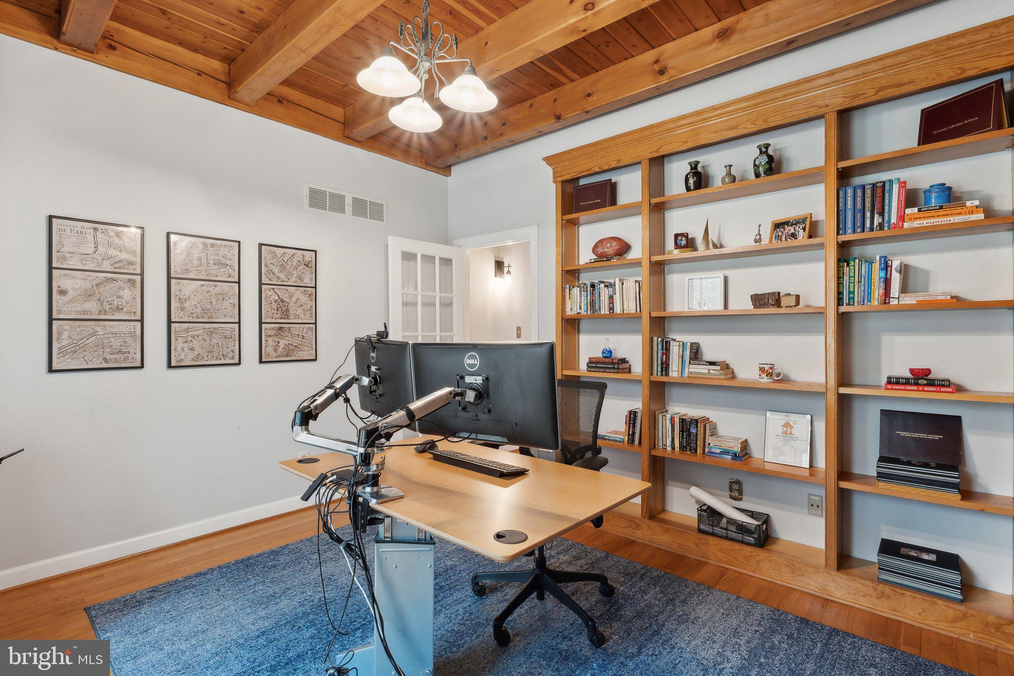 18600 Barnesville Road Barnesville, MD 20838 - Photo 30 of 108 a view of a workspace with furniture and a bookshelf