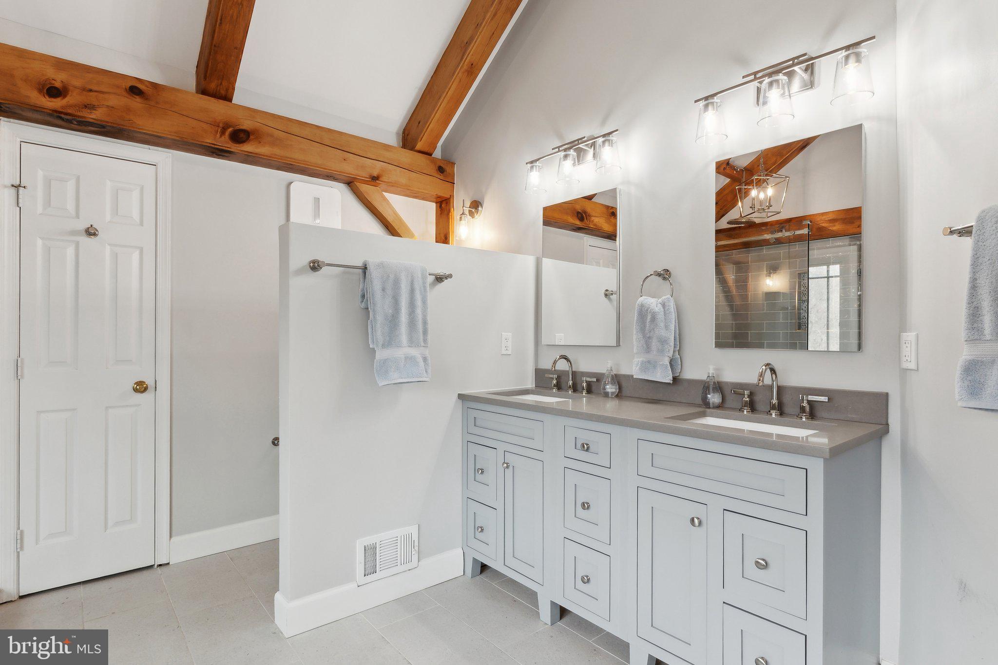 18600 Barnesville Road Barnesville, MD 20838 - Photo 40 of 108 a bathroom with a granite countertop sink mirror and double