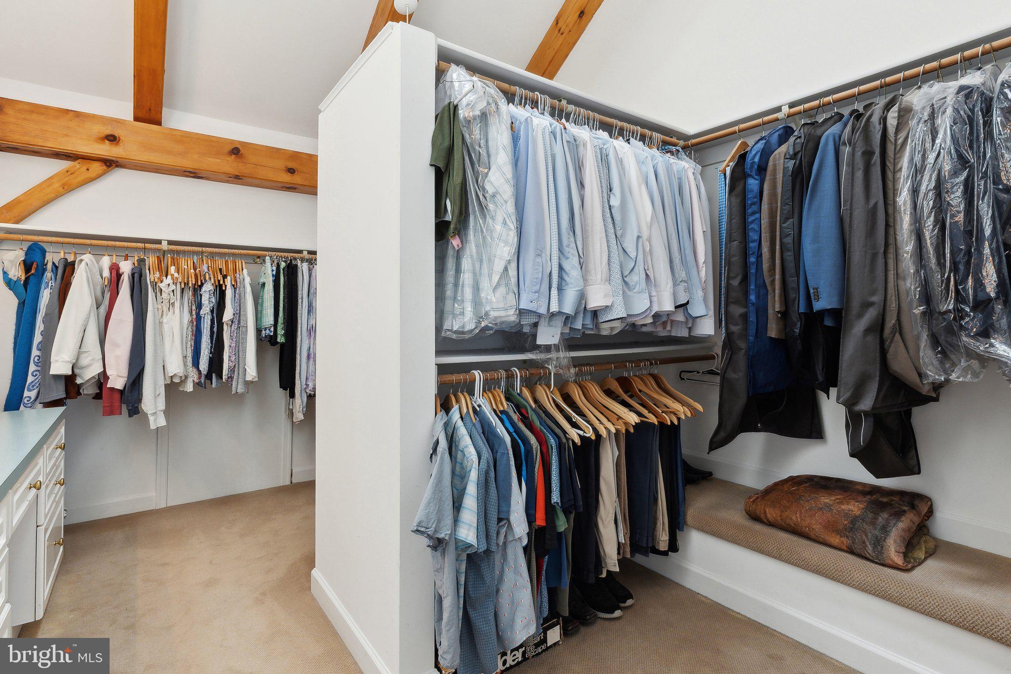 18600 Barnesville Road Barnesville, MD 20838 - Photo 41 of 108 a view of walk in closet with clothes and shoes