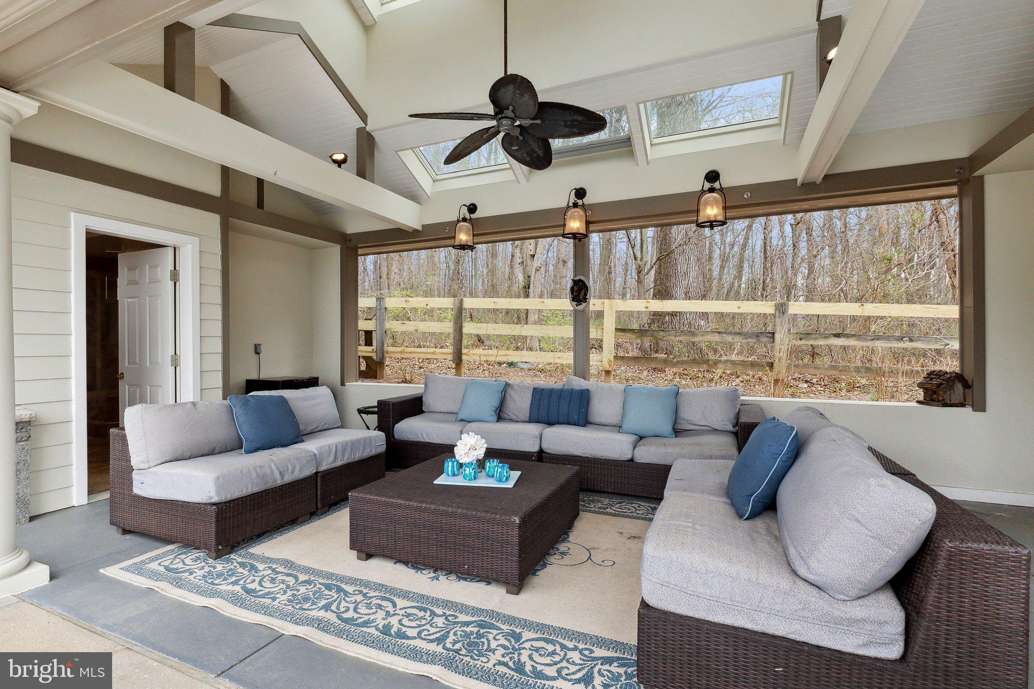 18600 Barnesville Road Barnesville, MD 20838 - Photo 63 of 108 a living room with furniture and a large window
