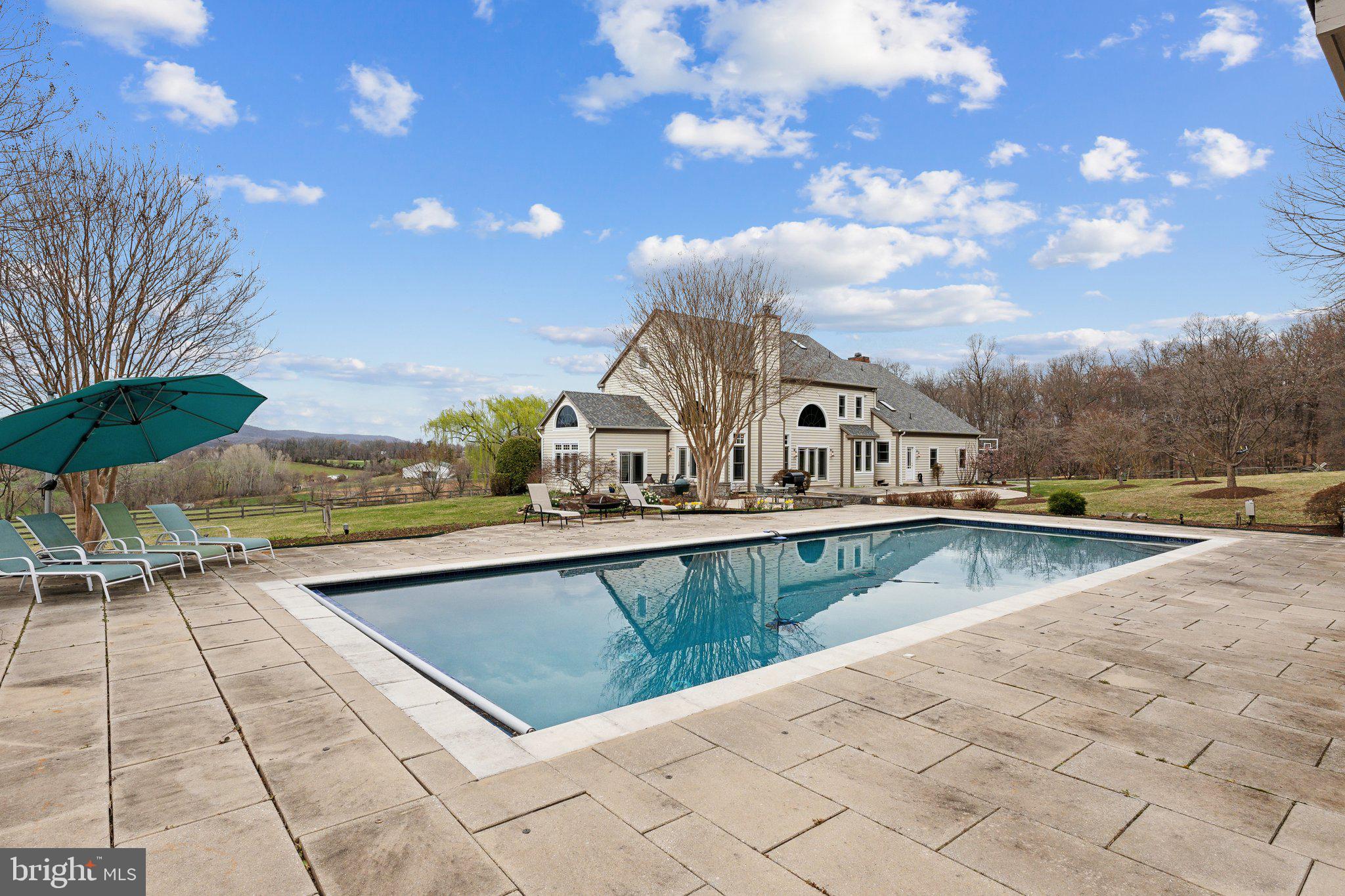 18600 Barnesville Road Barnesville, MD 20838 - Photo 67 of 108 a view of a swimming pool with an outdoor seating