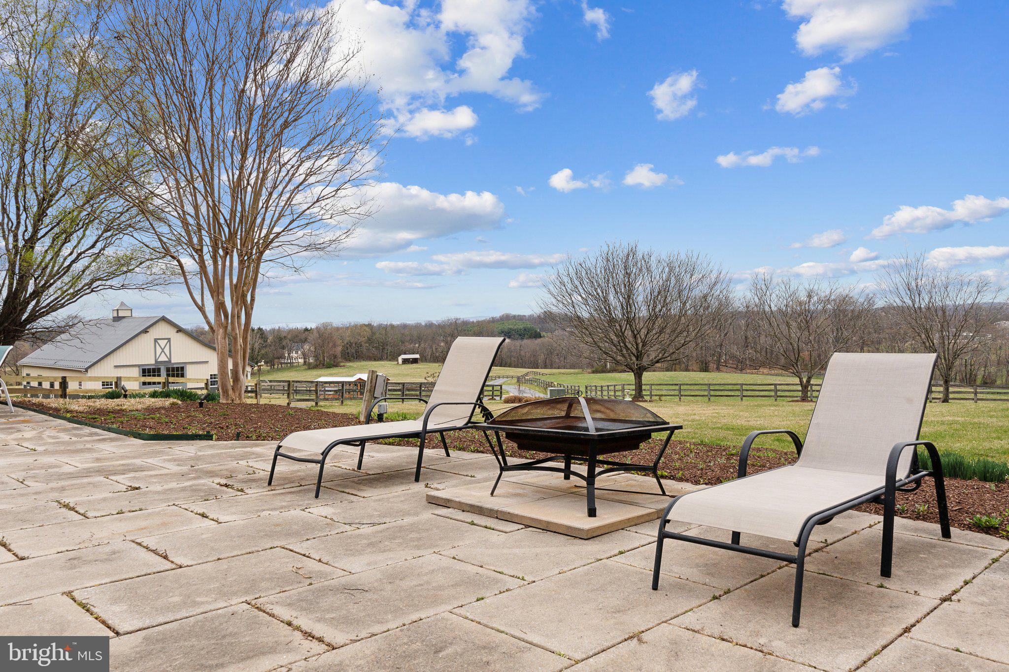 18600 Barnesville Road Barnesville, MD 20838 - Photo 71 of 108 a view of a terrace with furniture and a fire pit
