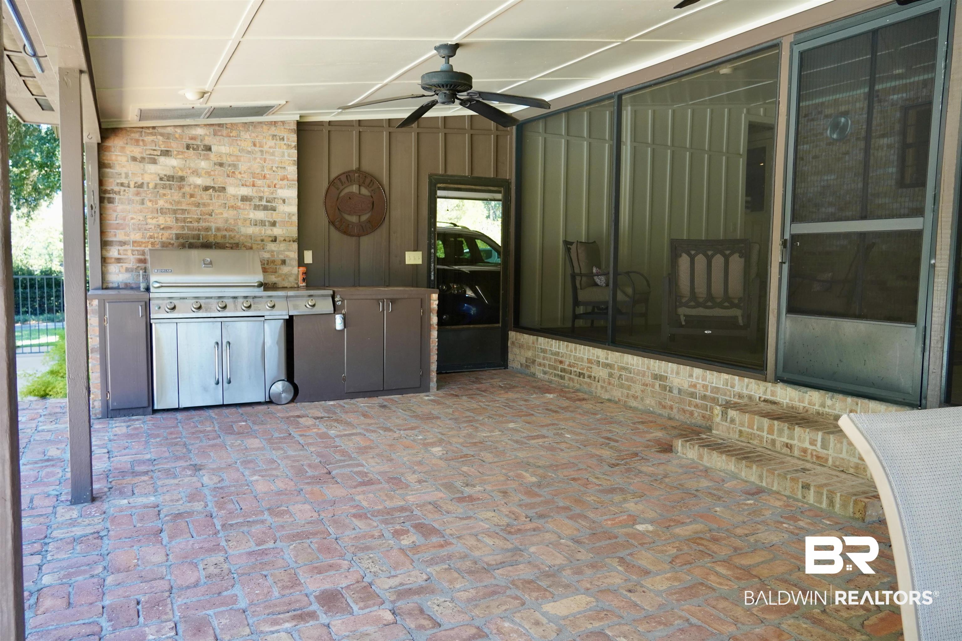 117 Belle Meade Brewton, AL 36426 - Photo 34 of 62 View of patio featuring a grill and ceiling fan