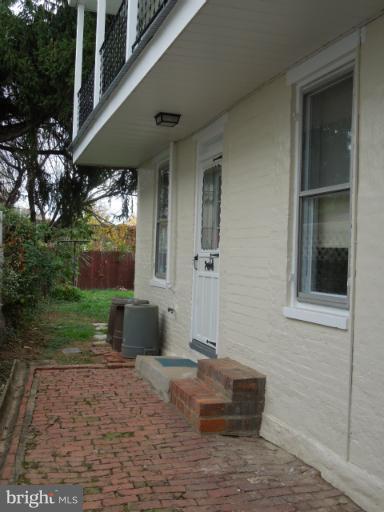 121 West 5th Street Frederick, MD 21701 - Photo 5 of 24 Kitchen Exit To Rear Fenced Garden
