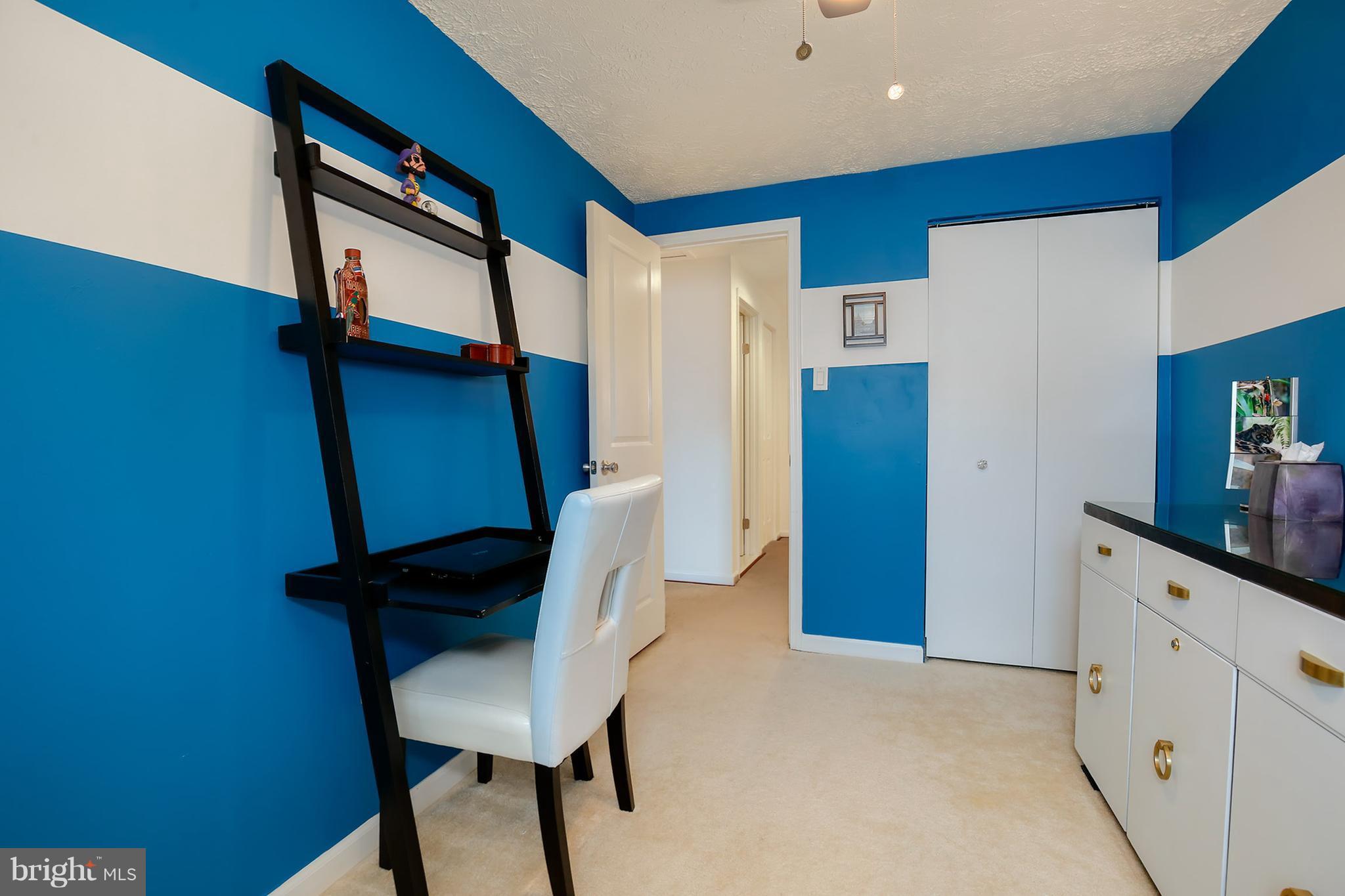 1119 Harvard Street Northwest, Unit R Washington, DC 20009 - Photo 24 of 26 a view of entryway with furniture and wooden floor