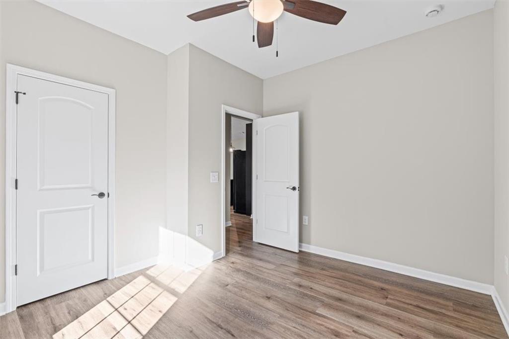 146 Old Brock Road Rockmart, GA 30153 - Photo 27 of 45 a view of an empty room with wooden floor