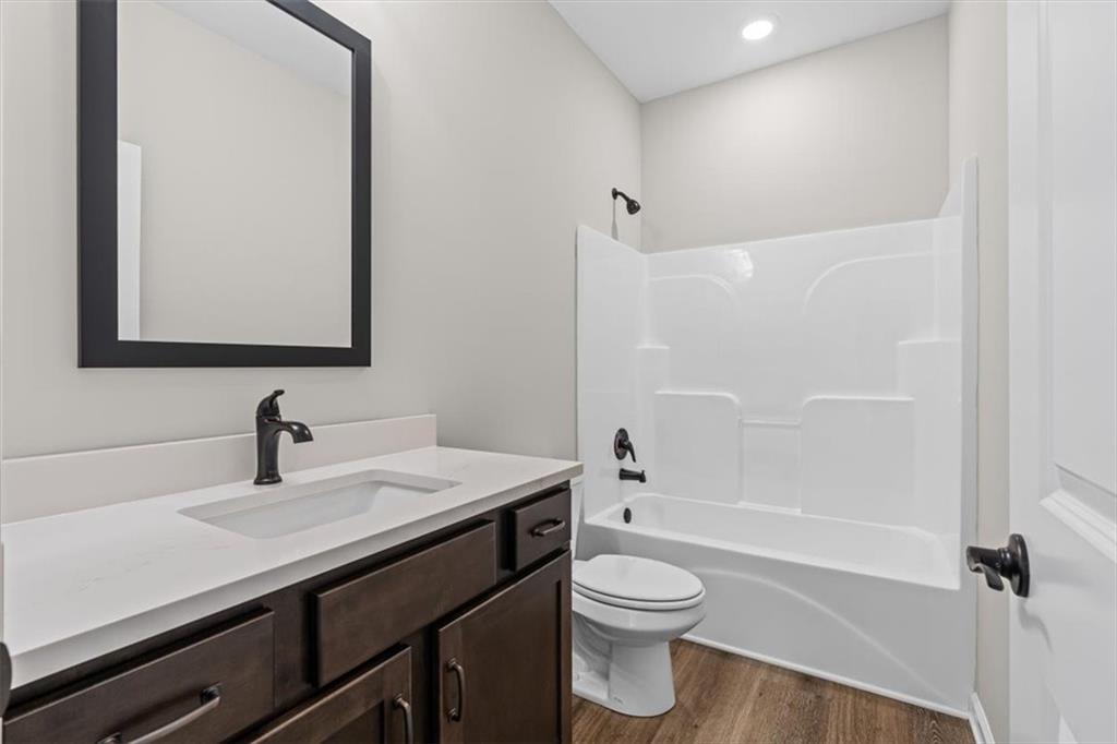 146 Old Brock Road Rockmart, GA 30153 - Photo 29 of 45 a bathroom with a sink a toilet and shower