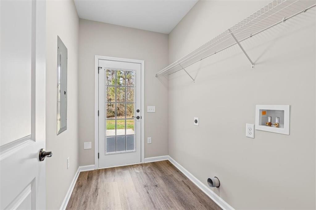 146 Old Brock Road Rockmart, GA 30153 - Photo 34 of 45 a view of an empty room with a window and wooden floor