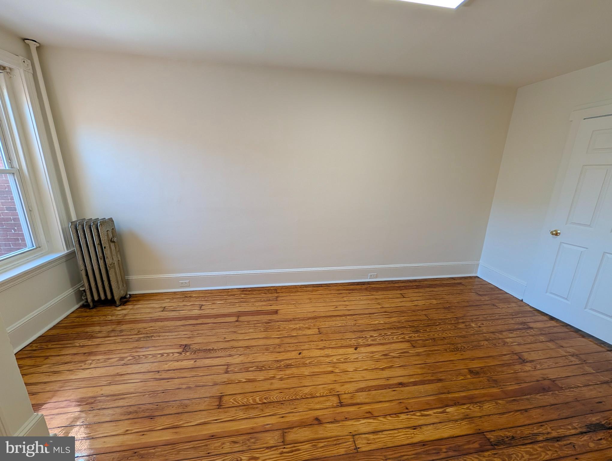 105 West 3rd Avenue, Unit 2 Conshohocken, PA 19428 - Photo 16 of 18 a view of room with window and hardwood floor