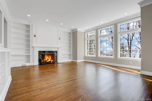 a kitchen with granite countertop sink and window