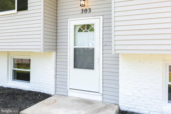 a front view of a house with a window