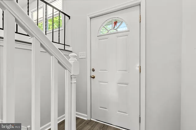 a view of front door with hallway