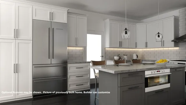 a kitchen with stainless steel appliances granite countertop a refrigerator and a stove