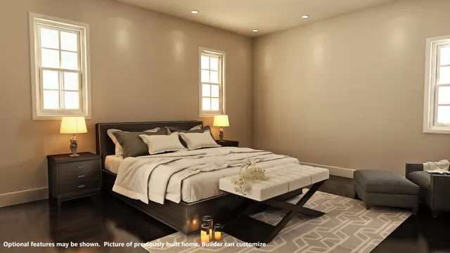 a bedroom with a bed a couch and a window