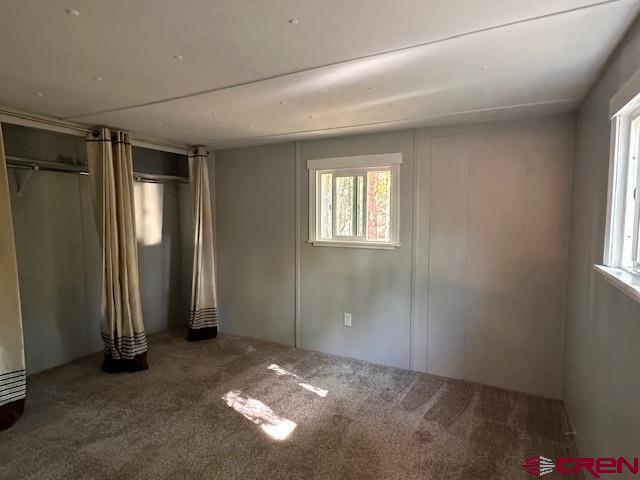 485 Florida Road, Unit D10 Durango, CO 81301 - Photo 14 of 14 an empty room with windows