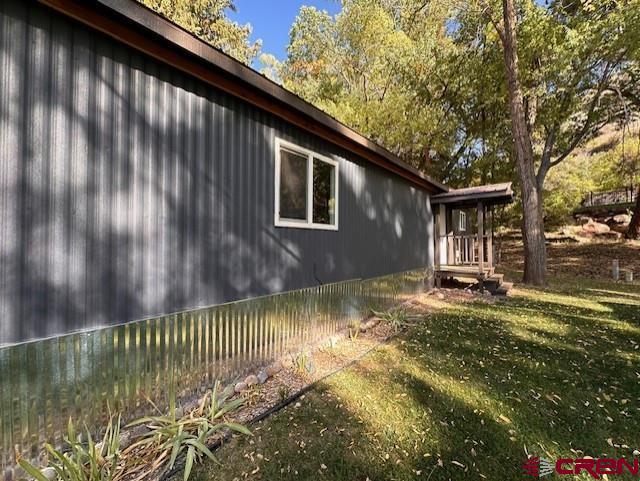 485 Florida Road, Unit D10 Durango, CO 81301 - Photo 4 of 14 a front view of a house with a yard