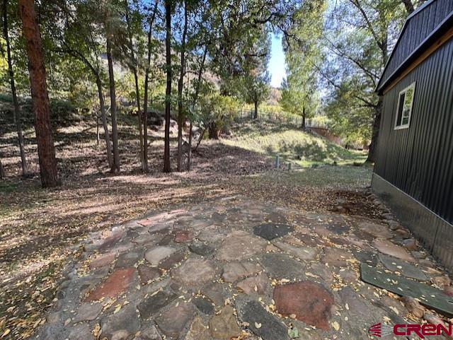 485 Florida Road, Unit D10 Durango, CO 81301 - Photo 7 of 14 a view of outdoor space with trees