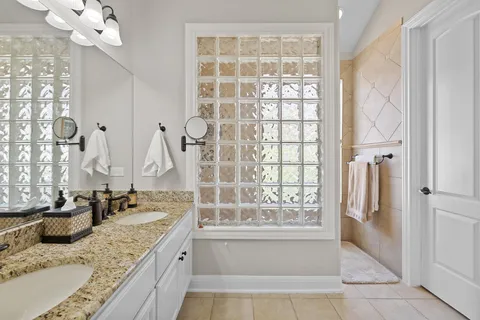 a bedroom with a bed and a desk