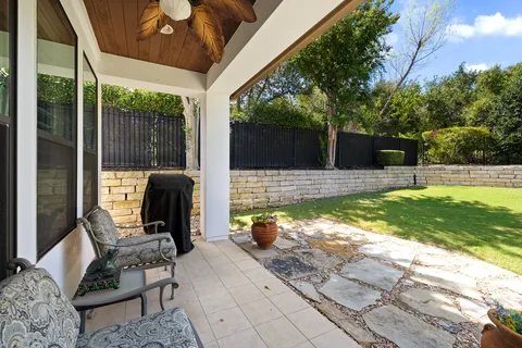 a view of a swimming pool with a patio