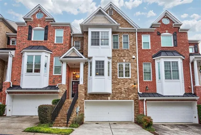 a front view of residential houses